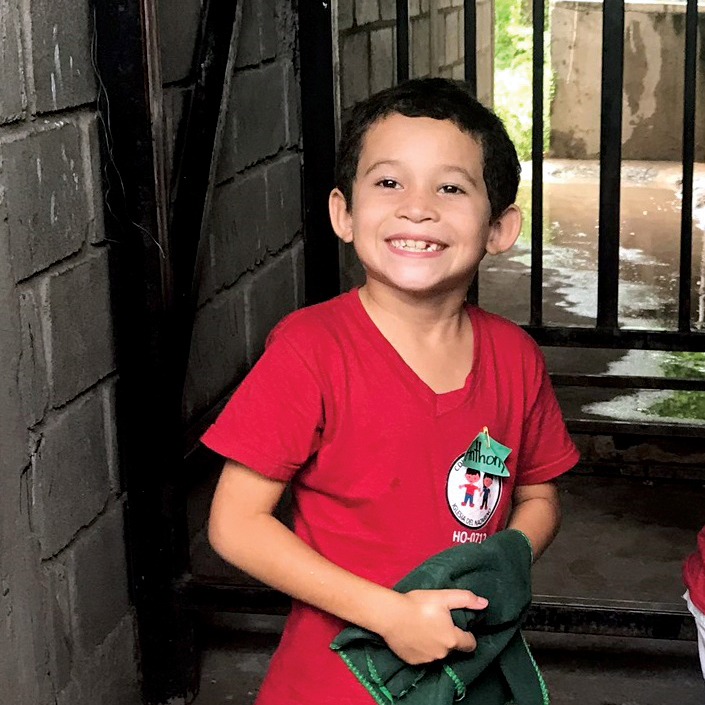 boy in red shirt